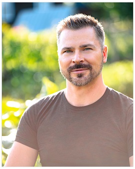 a man smiling for the camera